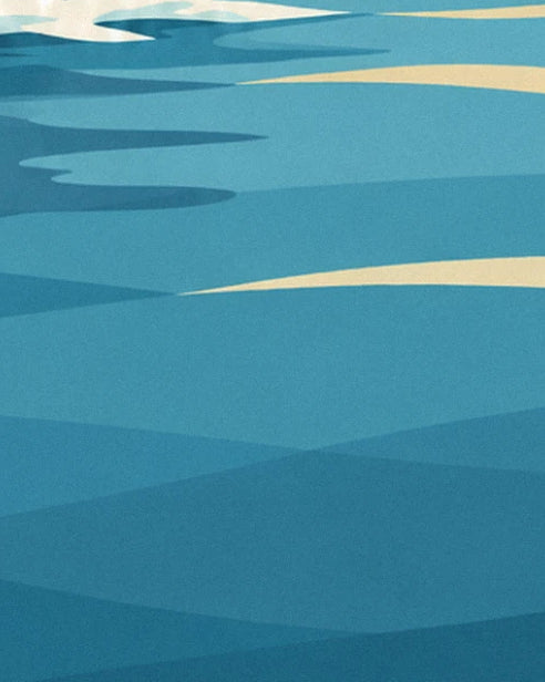 The turquoise ripples of the ocean, between blue shadows and golden reflections
