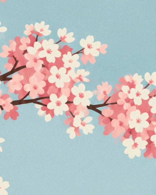 A branch with pink and cream blossom against the blue sky