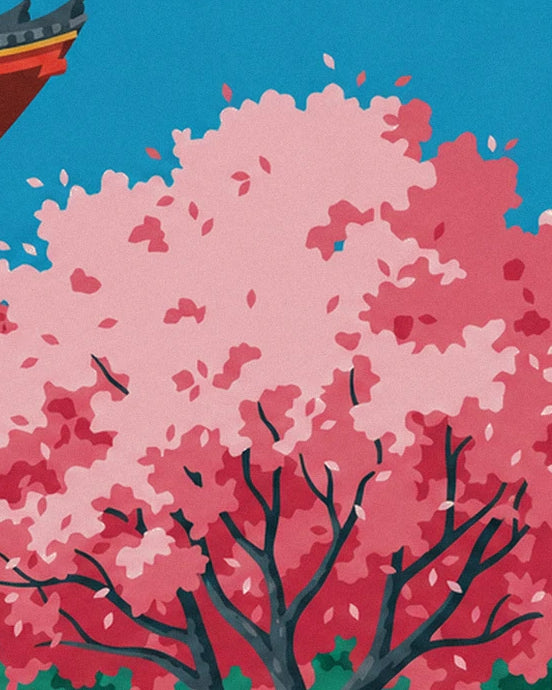 Die Kirschzweige voller hell- und dunkelrosa Blüten vor dem blauen Himmel