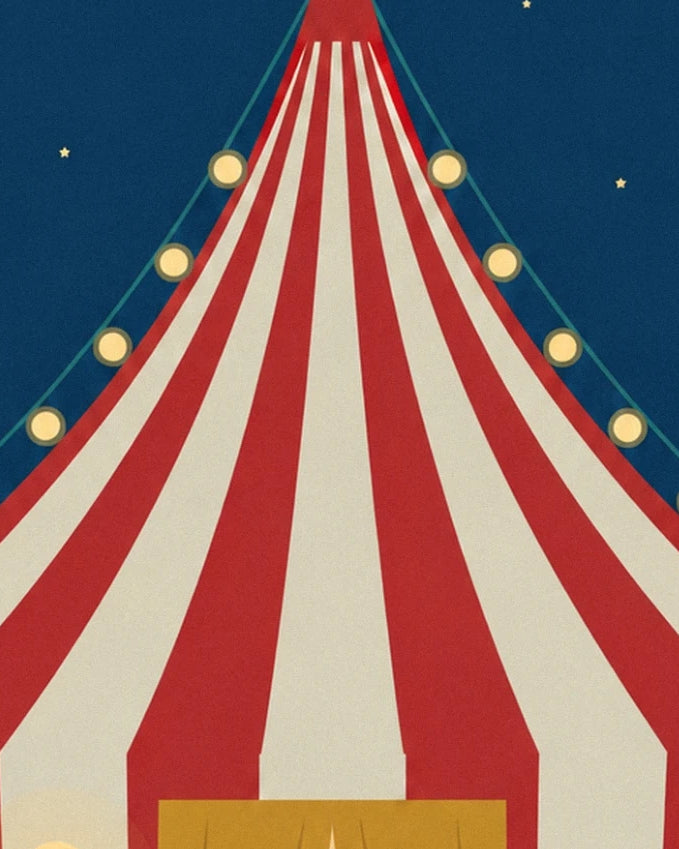 The top of the red and cream striped big top, lined with fairy lights
