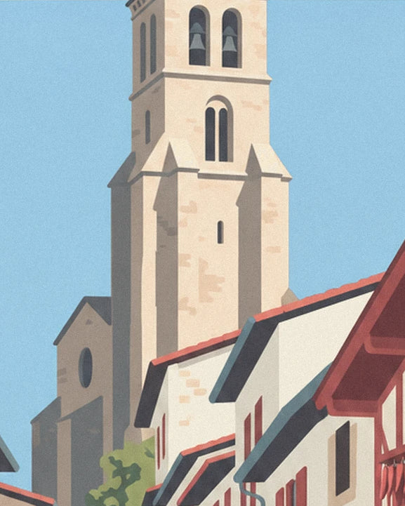 The pale stone bell tower above the red roofs of Ainhoa
