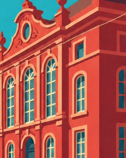 La façade rouge de l’hôtel de ville, ses hautes fenêtres et son fronton à volutes