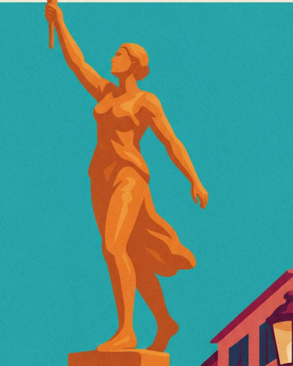 Golden statue of a woman raising her torch against a turquoise sky