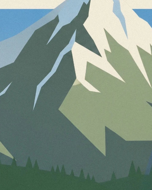 The rocky faces of a snow-covered mountain above a fir forest