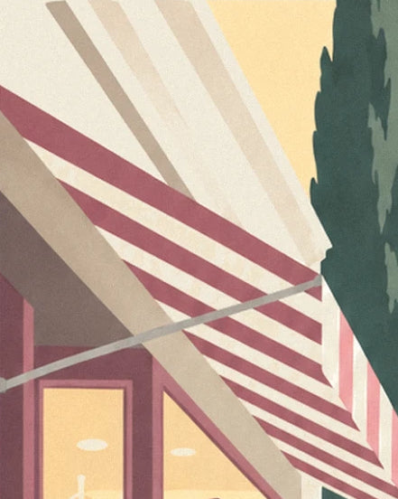 The burgundy and cream striped awning above a lit shop window, near a cypress