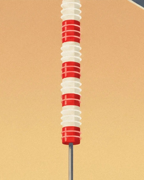 Une colonne de disques rouges et blancs sur une tige métallique devant un mur beige