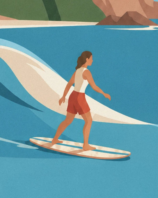 The female longboard surfer in red shorts and a white vest, standing on her board in the wave