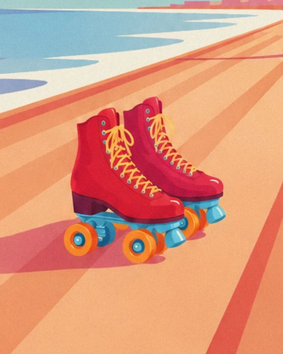 Les patins rouges aux lacets jaunes et aux roues orange sur la promenade