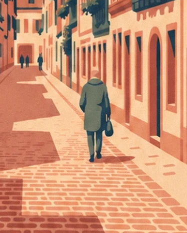 A figure in a green coat with a bag in the cobbled lane lined with salmon-coloured façades
