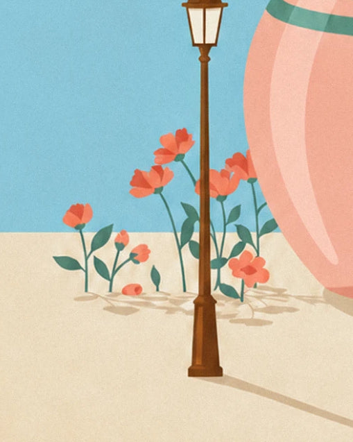 The brown iron street lamp surrounded by red flowers at the foot of the large pink pot