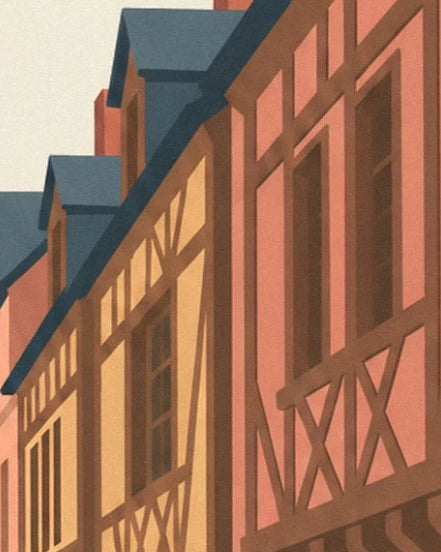 The ochre and coral façades with brown timber frames beneath slate blue roofs