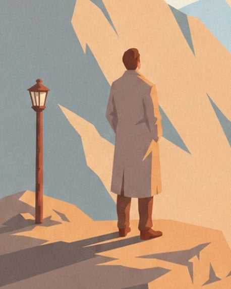A man in a light coat, seen from behind beside a street lamp facing the mountains