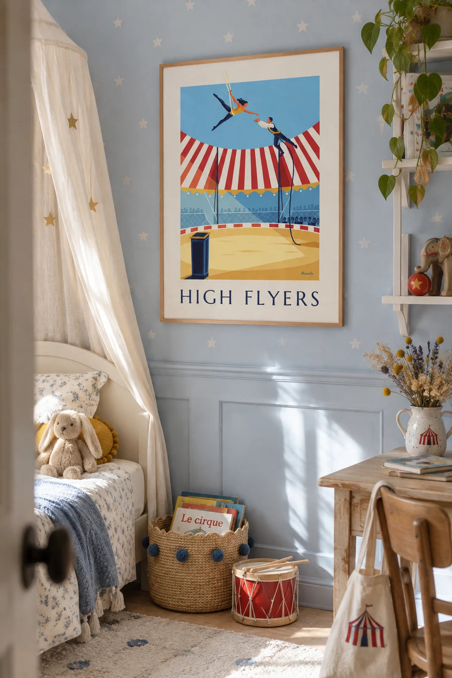 Poster of trapeze artists under a striped circus tent: framed on the wall