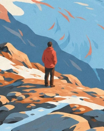 A figure seen from behind in a red jacket, facing the blue-tinged mountains