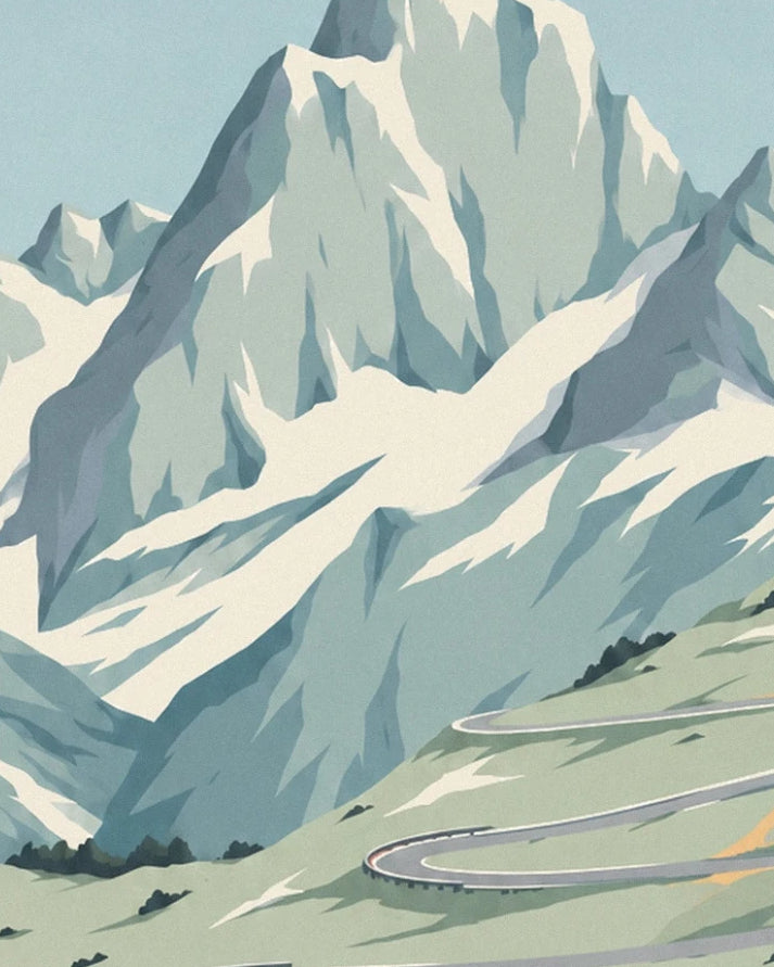 The snow-covered rocky peaks above the winding bends of the col du Stelvio