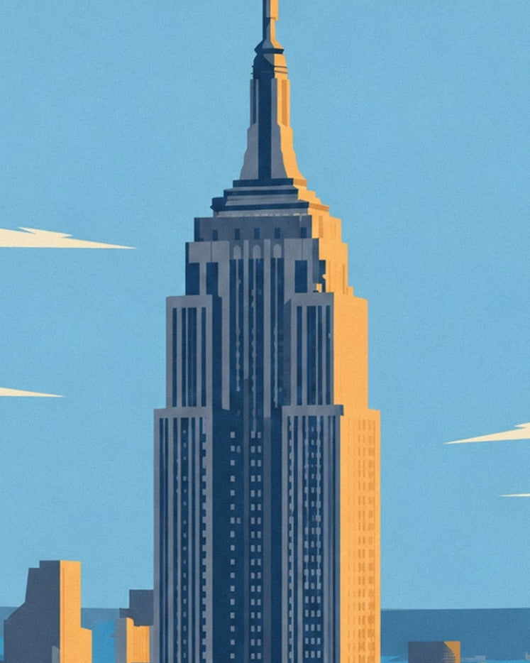 La flèche et les façades de l’Empire State Building baignées de lumière dorée