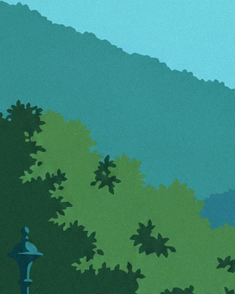 Collines bleu-vert au-dessus d'un feuillage vert, avec un petit lampadaire en bas