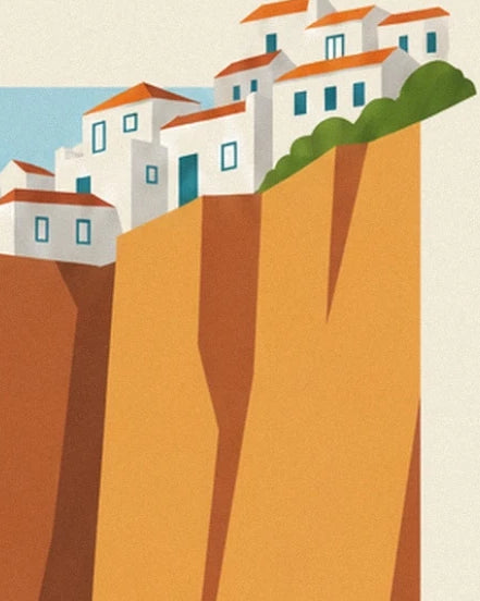 The white houses with orange roofs at the top of the cliffs of Ericeira