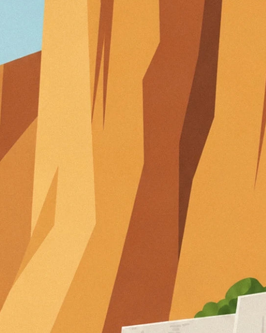 The tall ochre cliffs with brown shadows, edged with touches of greenery