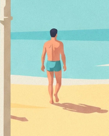 Un homme de dos en short turquoise sur le sable, face à la mer