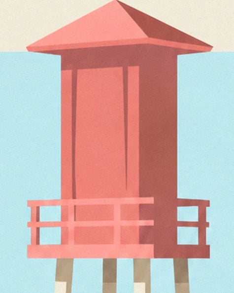 La cabine rouge de la tour de sauveteur, son toit pointu et sa balustrade