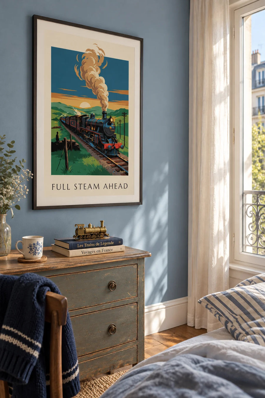 Poster of a steam locomotive speeding toward the horizon: framed on the wall