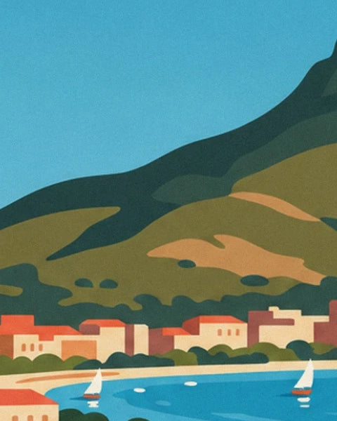 Les maisons aux toits orange au pied de la montagne verte, et 2 voiliers blancs sur la baie