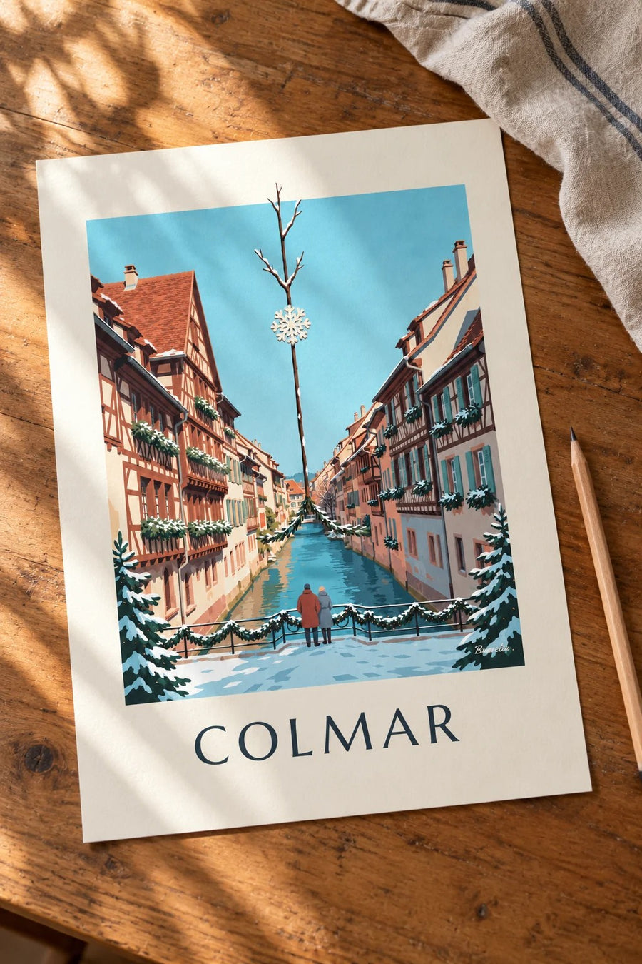 Affiche Petite Venise de Colmar à Noël : posée sur une table