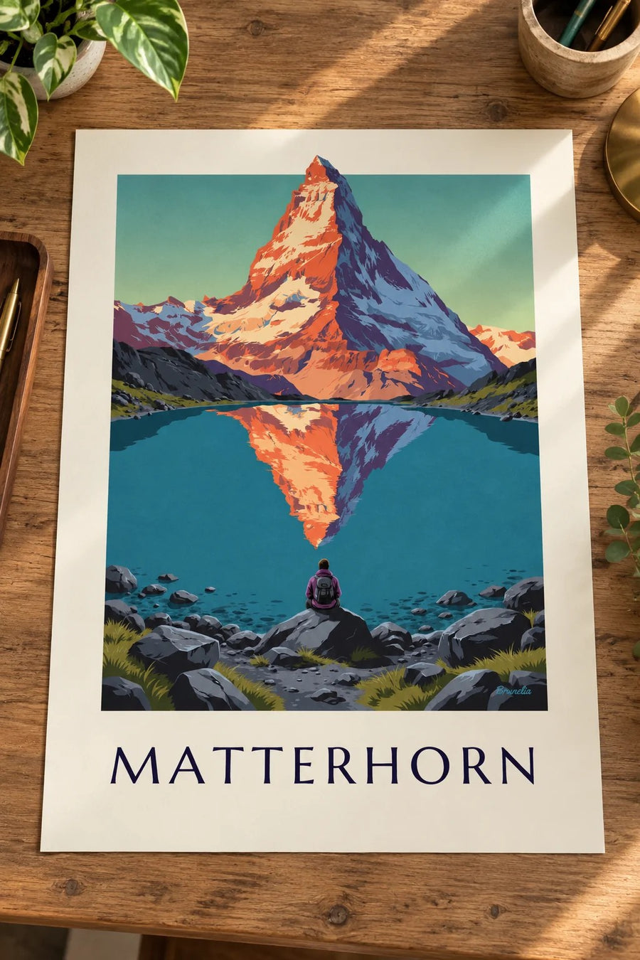 Poster Cervino al tramonto riflesso in un lago alpino: appoggiato su un tavolo