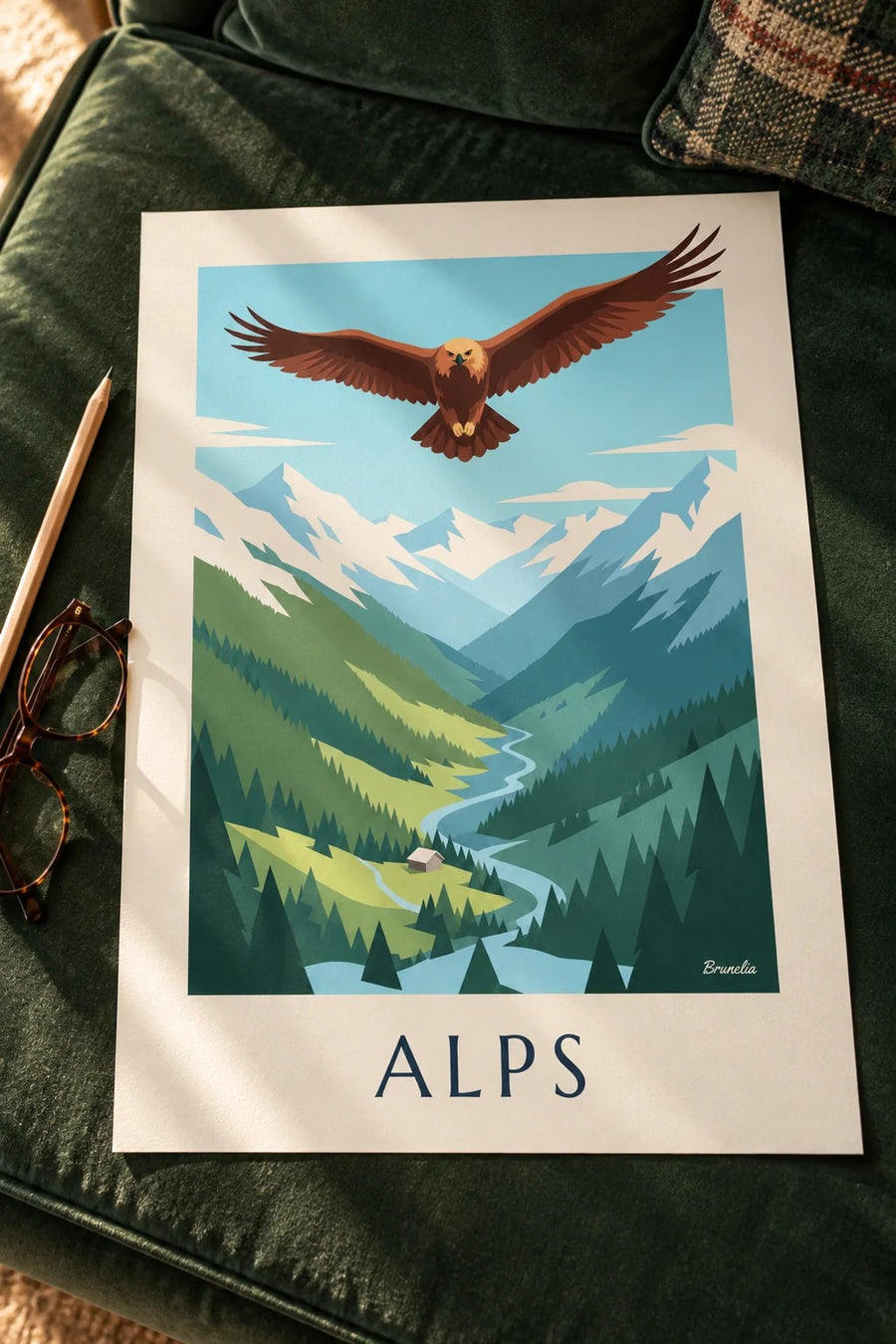 Poster Steinadler über einem Alpental: flach auf einem Tisch