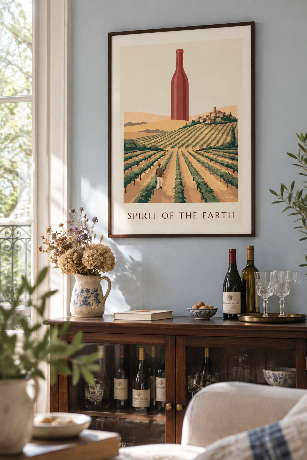 Red wine bottle among countryside vines poster on the wall