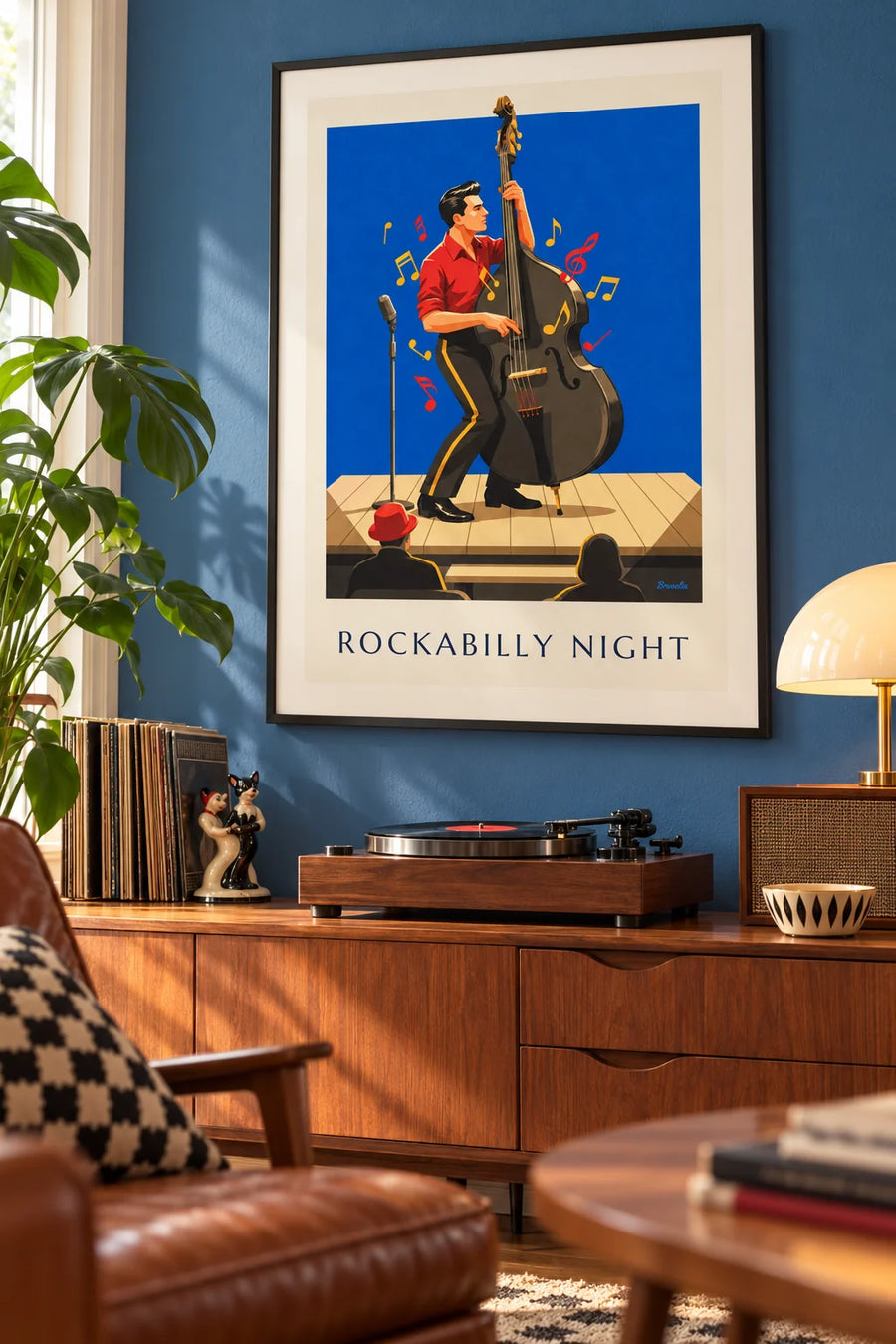 Poster di una serata rockabilly e di un musicista con il contrabbasso: incorniciato alla parete