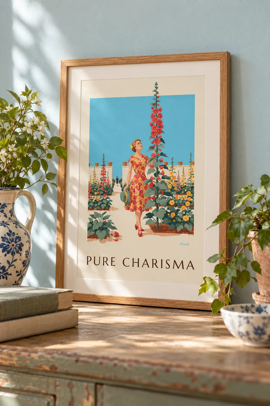 Poster of a woman in a floral dress in a sunny garden: small framed A4 size